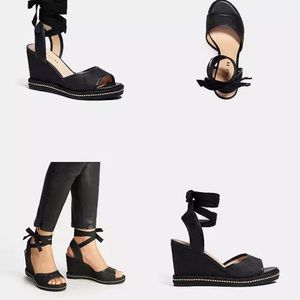 Brand new Coach black wedges size 8.5